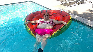 Short Video of BBW Nurse Vicki Floating on Her Huge Watermelon