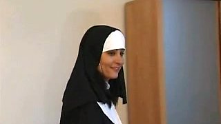 A nun gives some spanking to a naughty blonde