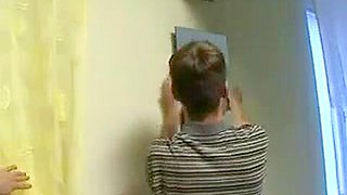 Rus Mom hang curtain with son. Fake Video