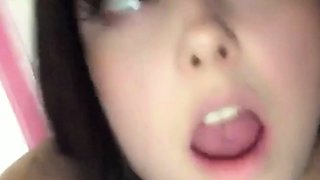Beautiful teen brunette Jessica Sinn masturbates