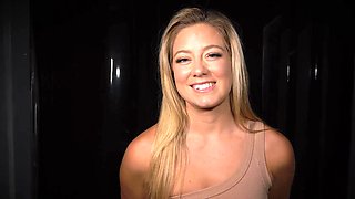 Blonde tested in a bondage room with suspension equipment
