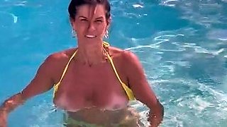 Busty curly brunette with big boobs fucks on couch