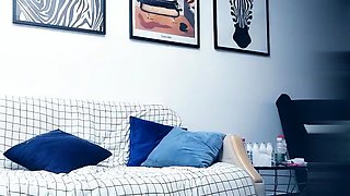 Cute amateur asian web cam girl playing with her toy