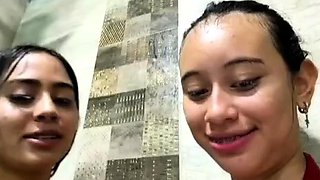 Two teens taking a shower taking a shower 857128009632007489