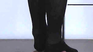 The Slave's Orgasm Under Mistress Cleo's Stocking Feet