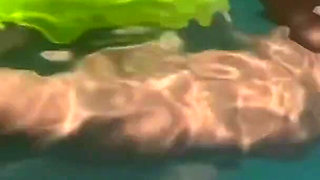 Artemisia Love Swimming in the Pool Flashing Her Big Juicy Boobs and Smoking a Cigarette