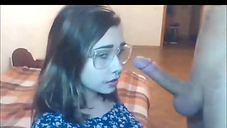 Nerd babe with glasses gets face fucked by her boyfriend on webcam