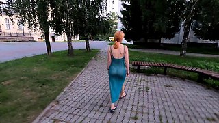 walks in a transparent dress