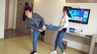Chinese ballbust in tight jeans
