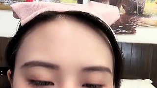 Horny Japanese teen in school uniform sucks cock