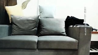 Cute amateur asian web cam girl playing with her toy