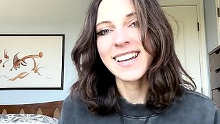 Busty curly brunette with big boobs fucks on couch