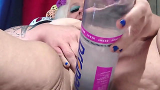 Big Bottle Plugged Clit Cunt