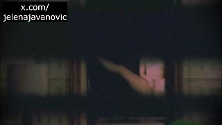 Spy Blonde Woman at the window