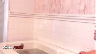 Brunette Japanese Anne passionately sucks cock in POV during steamy shower fun