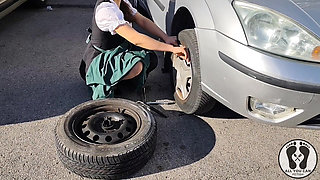 Dirndl Slut Gets Dirty and Oily Changing Tires