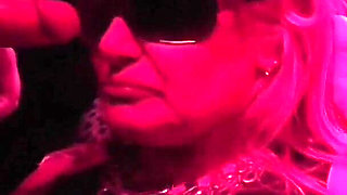 MILF with 2 Young Guys in a Swinger Club