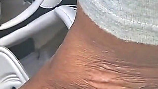 Barefoot Passenger Blue Toes Foot Play While Riding in the Car