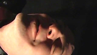 Sexy dominatrix slaps guy's ass and ties his cock and balls
