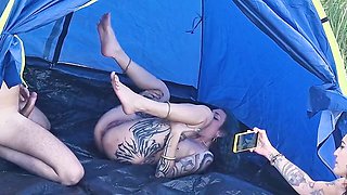 Bottle flipping game on the beach leads to unforgettable holiday fun with two stunning women