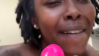 Nasty Ebony Bitch Sucks Dildo with Passion