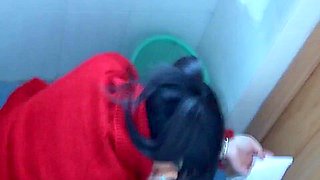 Lustful Asian taking a crap in a public toilet