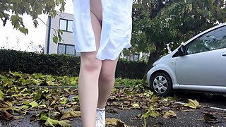 Outdoor solo masturbation scene with curly blonde