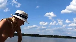 Big-Ass Blonde's Naked Walk on a Paddleboard