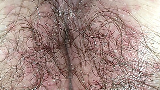 Hairy pussy from behind fingering