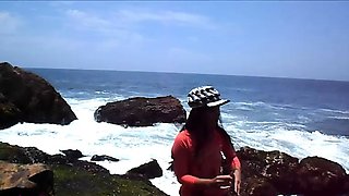 Amateur Asian teen masturbates outdoors