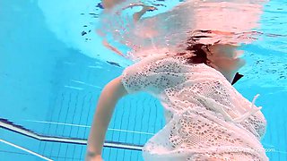 White dressed tight hairy babe Kathy Magpie underwater