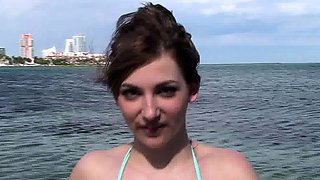 Attractive brunette teenager with big boobs fingering pussy