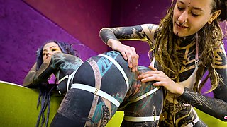 Tattooed hotties fuck each other with crazy toys