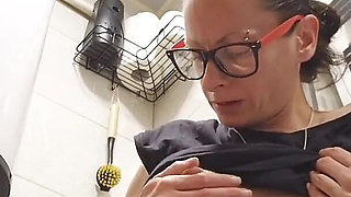 Stepmom Secretly Masturbates in the Toilet While Stepson in the Next Room Watches