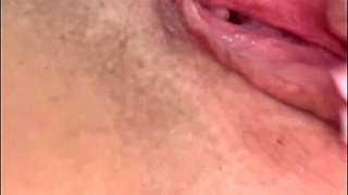 European brunette having fun with her dildo