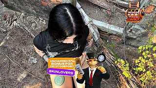 Goth woman and partner in abandoned building