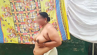 Traditional kerala style dressed Bhabi showing her huge sexy boobs, walking topless