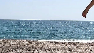 Fans Peeping Me Giving a Blowjob on a Public Nudist Beach