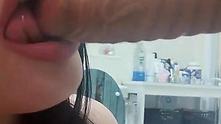 Sucking My Dildo Against the Door