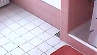 Amateur blonde masturbates on toilet