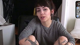 Amateur brown-haired with tats masturbates alone