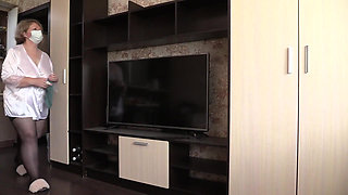 A Mature Wife with a Big Ass in White Panties in Everyday Life, Behind the Scenes. a Home Camera Watches This Plump MILF.