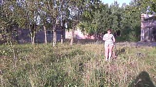 A unshaved muff pisses outdoors in public places. Lots of urine from a bodacious COUGAR with a phat bum. Amateur fetish.