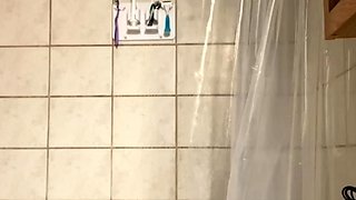 TEEN BRUNETTE SISTER CAUGHT MASTURBATING IN SHOWER