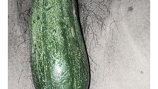 Cucumber put in the ass of a female friend