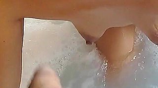 In the Jacuzzi She Starts to Masturbate Me with Her Fantastic Feet