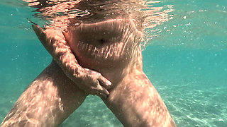 Naked MILF Swimming with Anal Plug Underwater