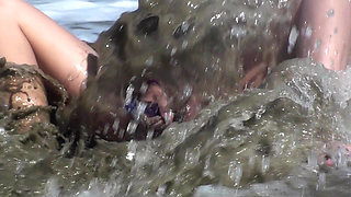 Teeny Squirts Into the Sea