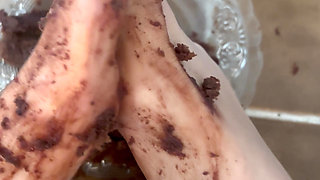 Destroying chocolate cake with my feet