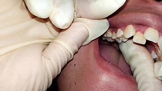 Trying to Use Dental Floss (close-up)